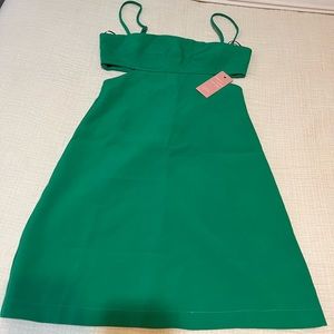 Brand new with Tags! It’s the perfect green dress for fall.
